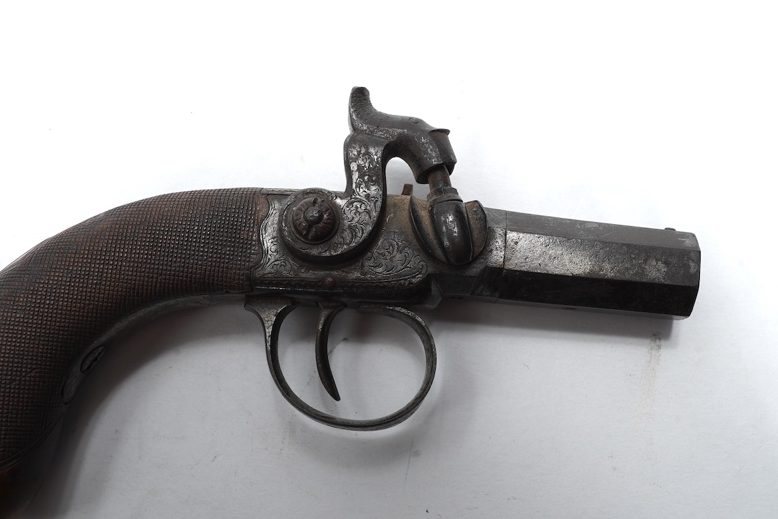 A boxlock side hammer percussion pocket pistol retailed by Weston of Brighton, foliate engraved frame and side hammer, Birmingham proved, rounded chequered walnut grip, barrel 3.5cm